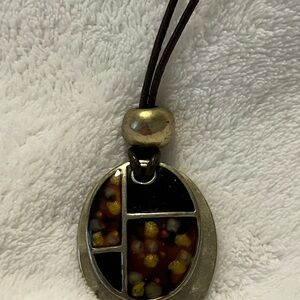 Oval Pendant Necklace with Black and Gold Accents